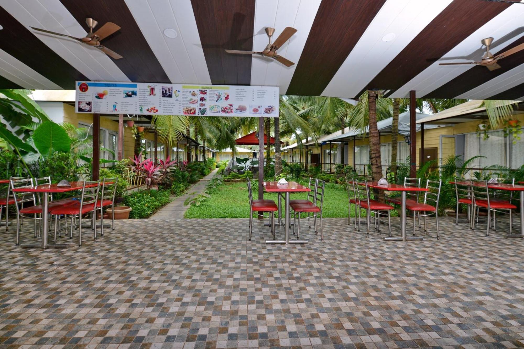 Collection O Retreat Morjim Resort Exterior foto