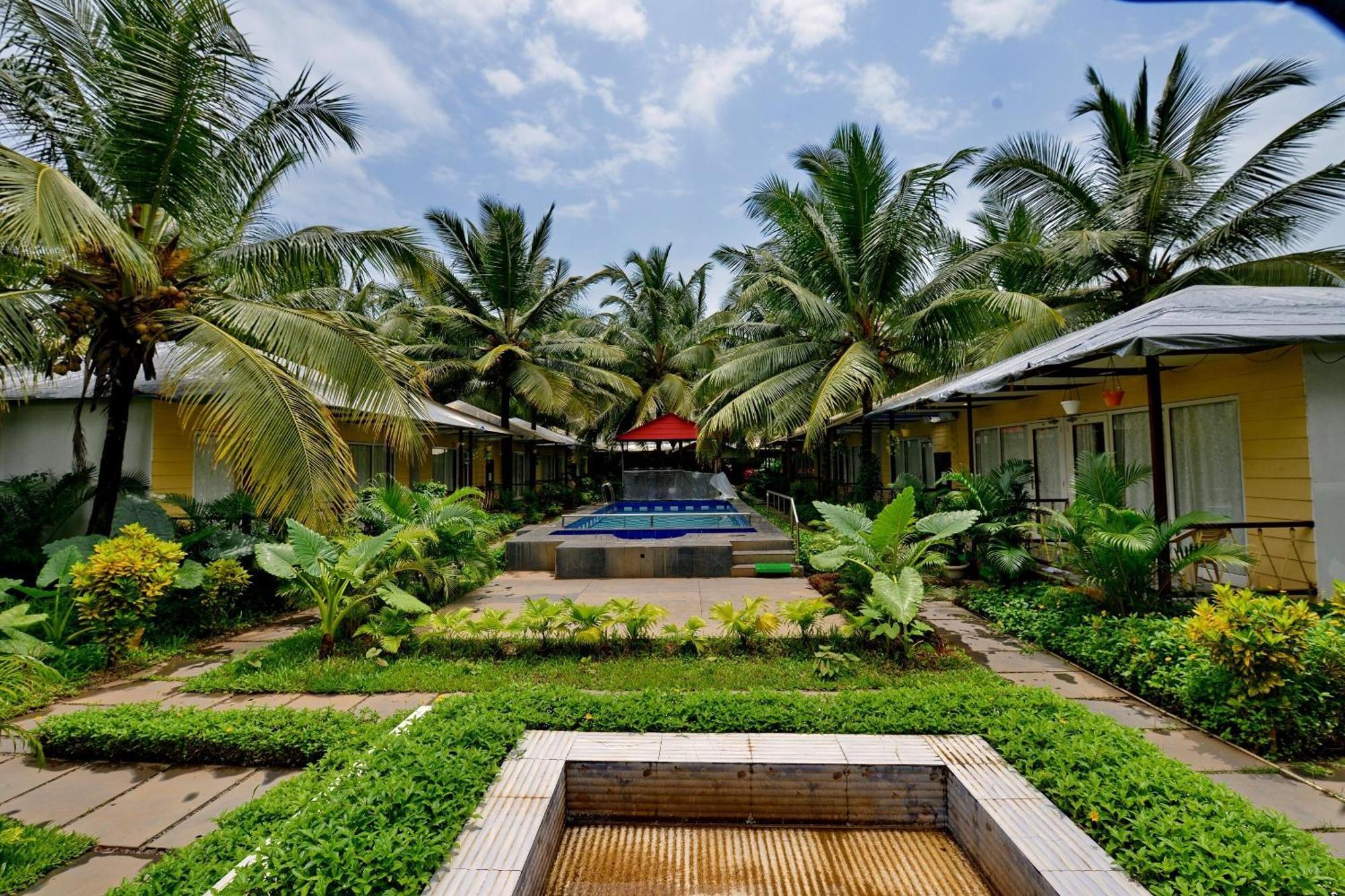 Collection O Retreat Morjim Resort Exterior foto